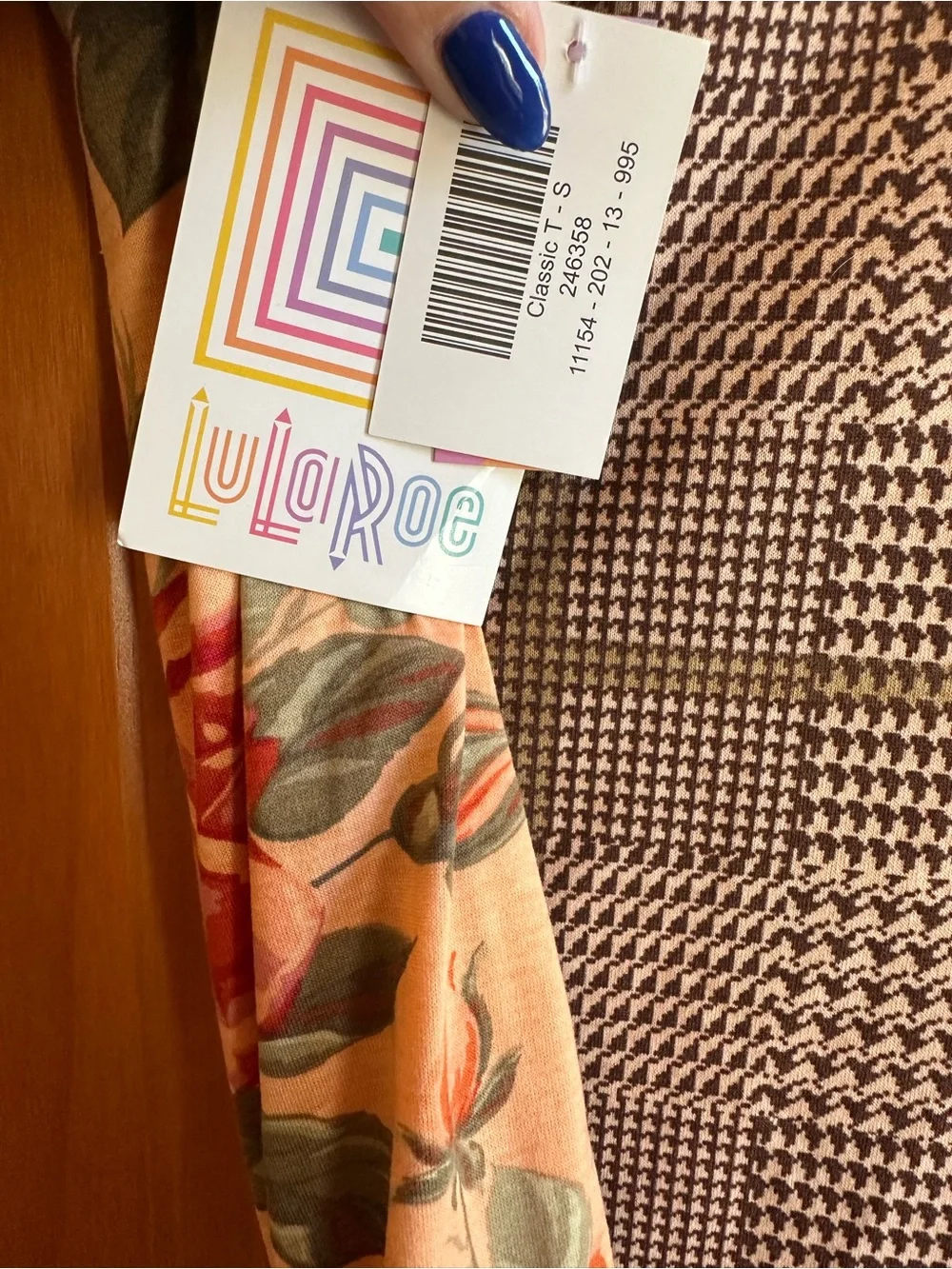 LuLaRoe Classic T Peach Floral Scoop Neck Top with Black-and-White Sleeve Accent